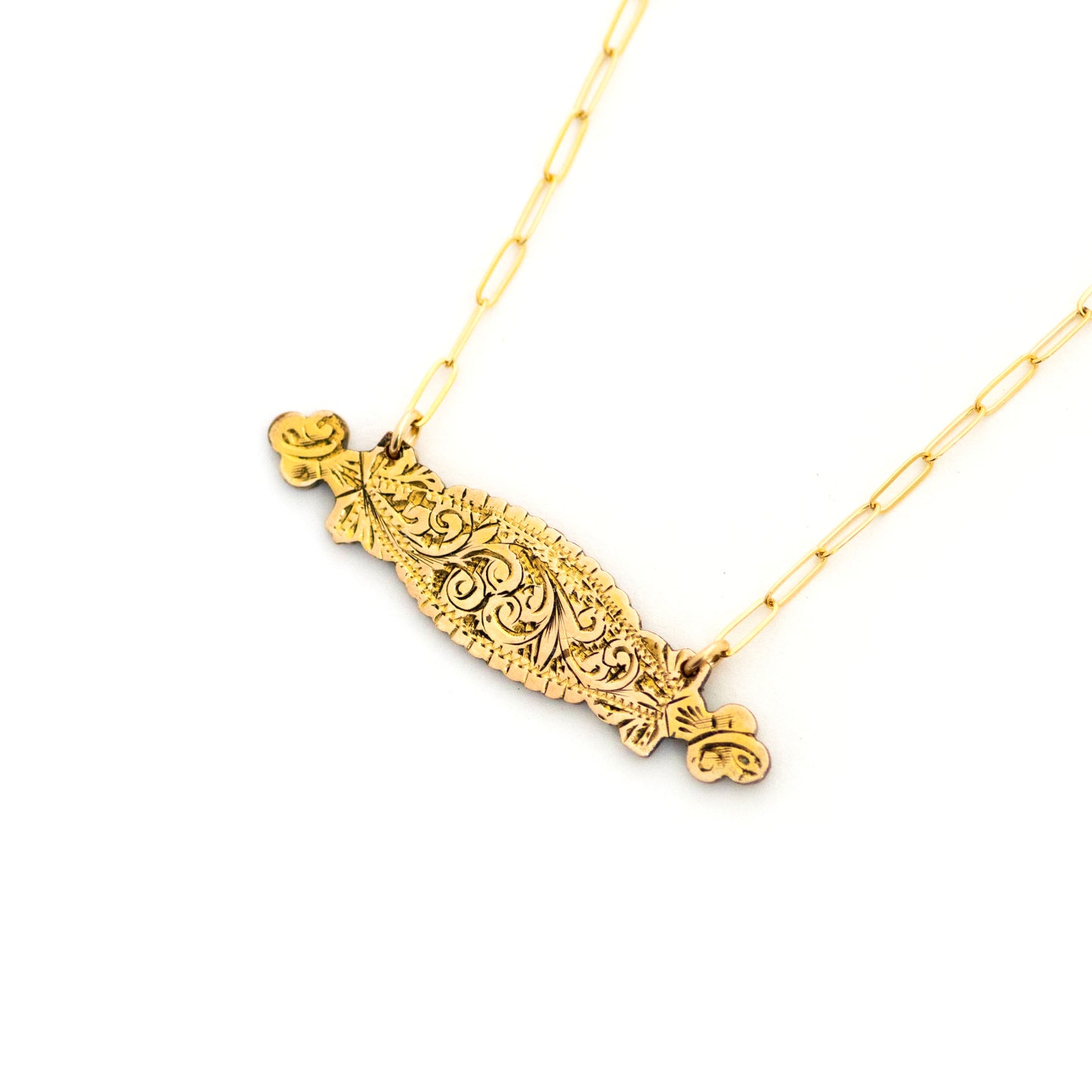 This one-of-a-kind conversion necklace is made up of: Gold filled Victorian bar pin pendant from the late 1800s with hand engraved scrolling floral details.