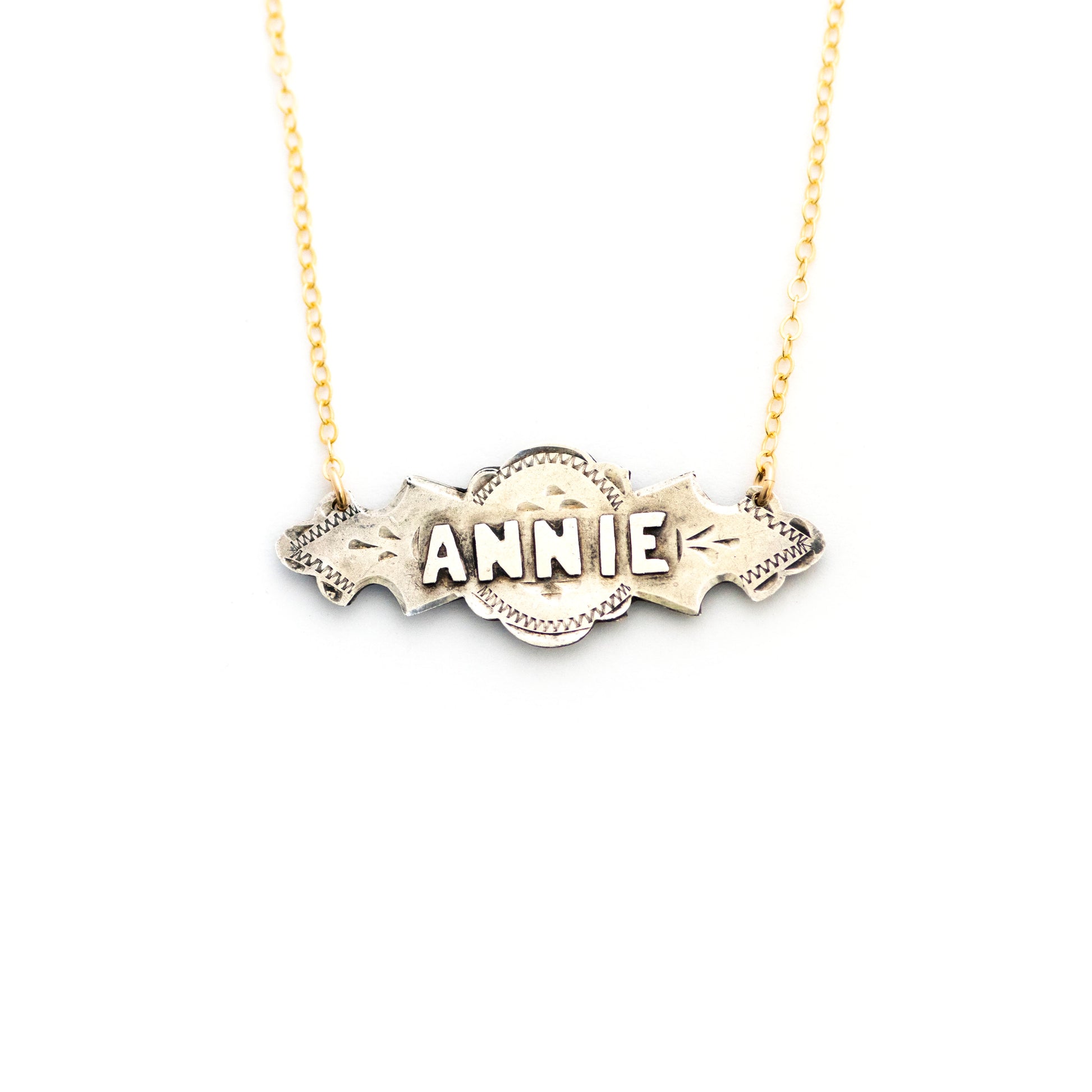 This one-of-a-kind conversion necklace is made up of:  Sterling silver Edwardian bar pin pendant from the early 1900s with hand engraved details and the name "ANNIE".