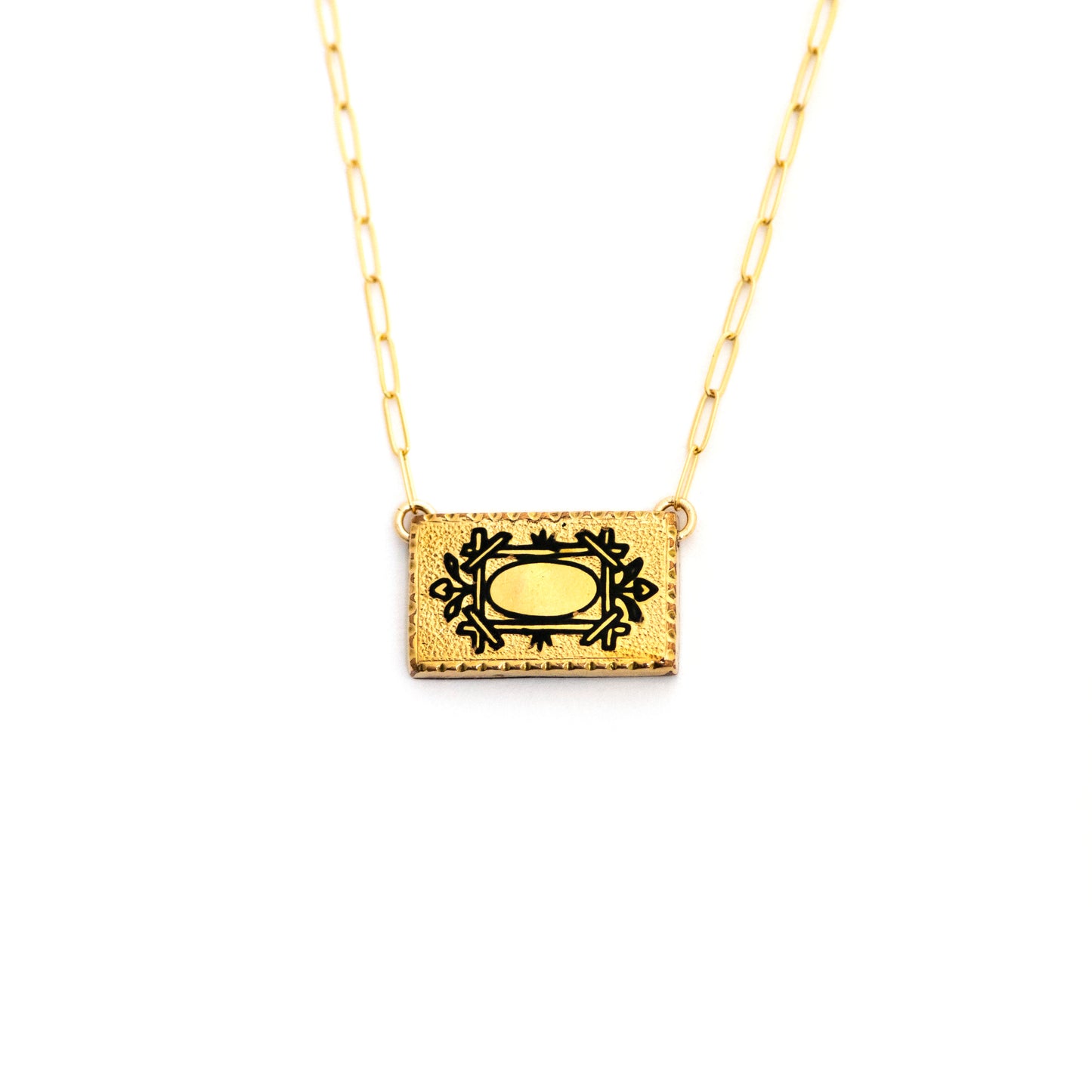 This one-of-a-kind conversion necklace is made up of: Gold filled Victorian cuff link from the late 1800s with hand tooled details and black enamel tracery (taille d'epargne) forming the shape of a frame.