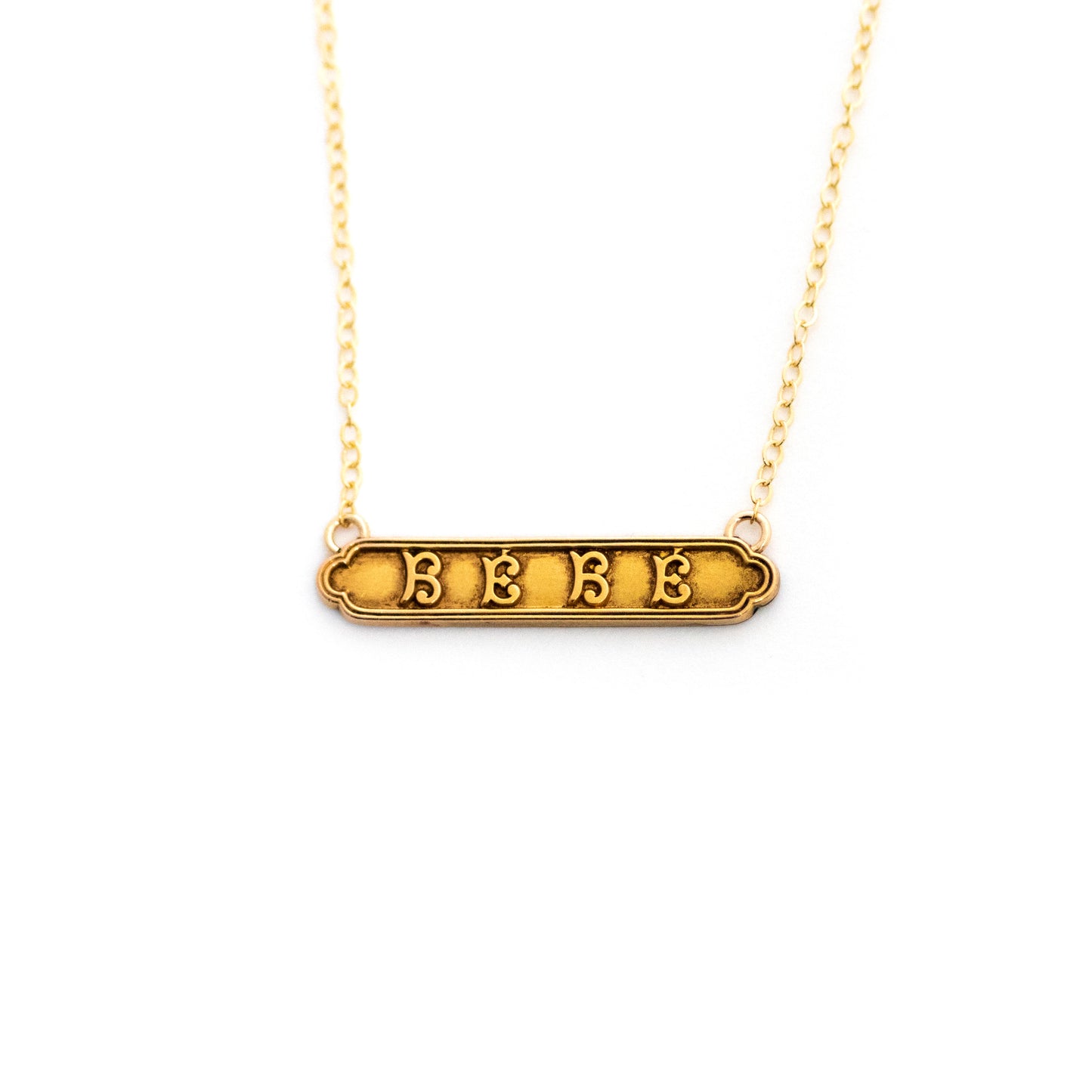 Gold filled antique Victorian baby bar pin pendant from the late 1800s with the French word "BEBE".