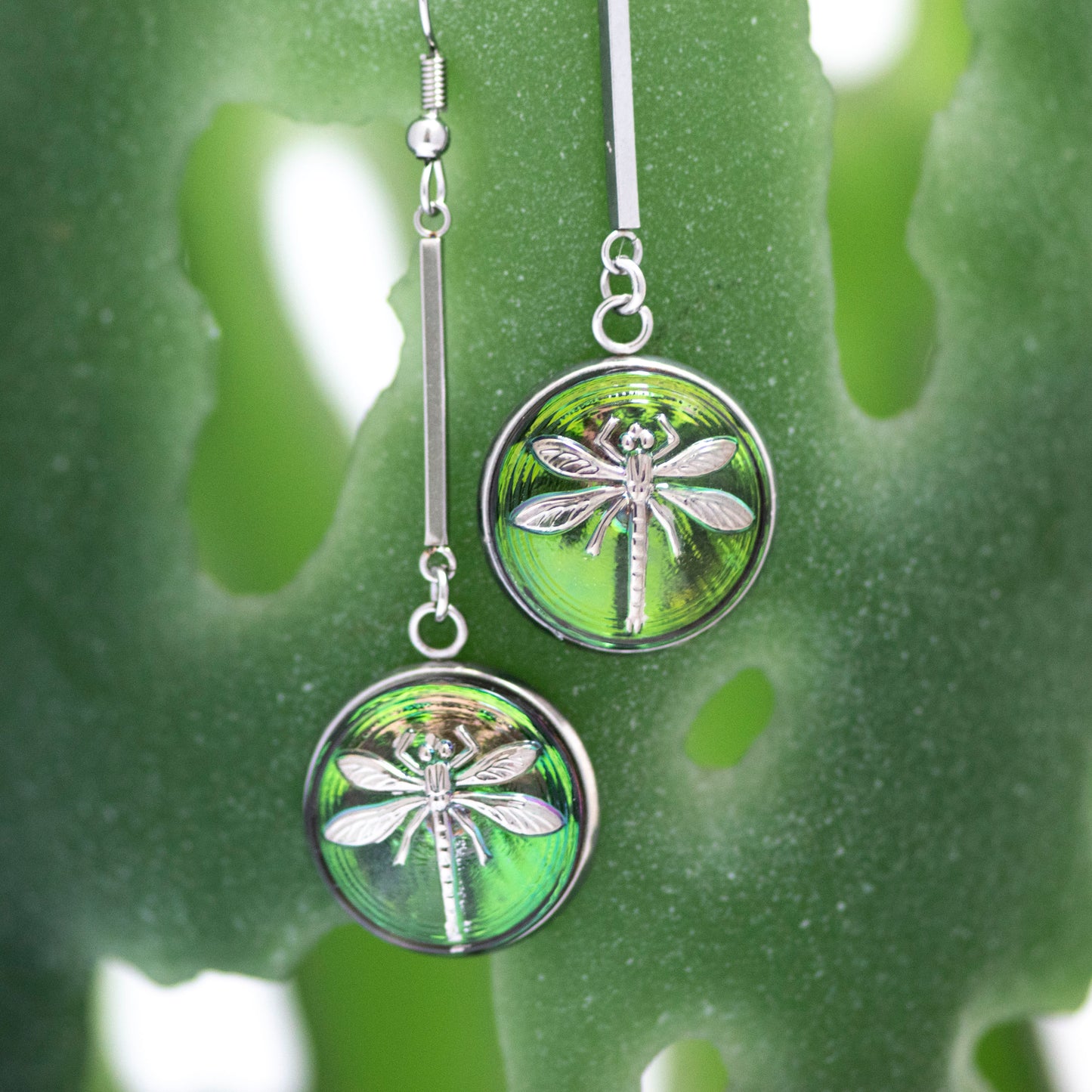 Green and platinum painted Czech glass buttons drop dangle earrings.