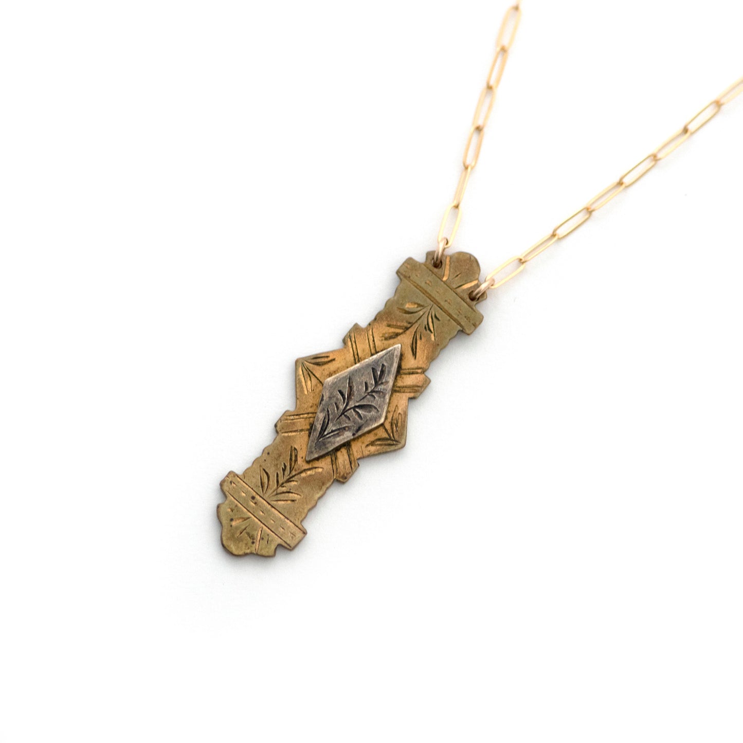 This one-of-a-kind conversion necklace is made up of: Sterling on Brass Victorian bar pin pendant from the late 1800s with hand engraved details. Aesthetic Movement.