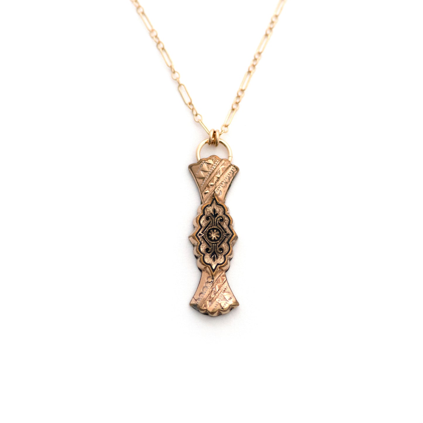Gold filled Victorian bar pin pendant from the late 1800s with hand engraved and taille d'epargne (black enamel tracery) details.