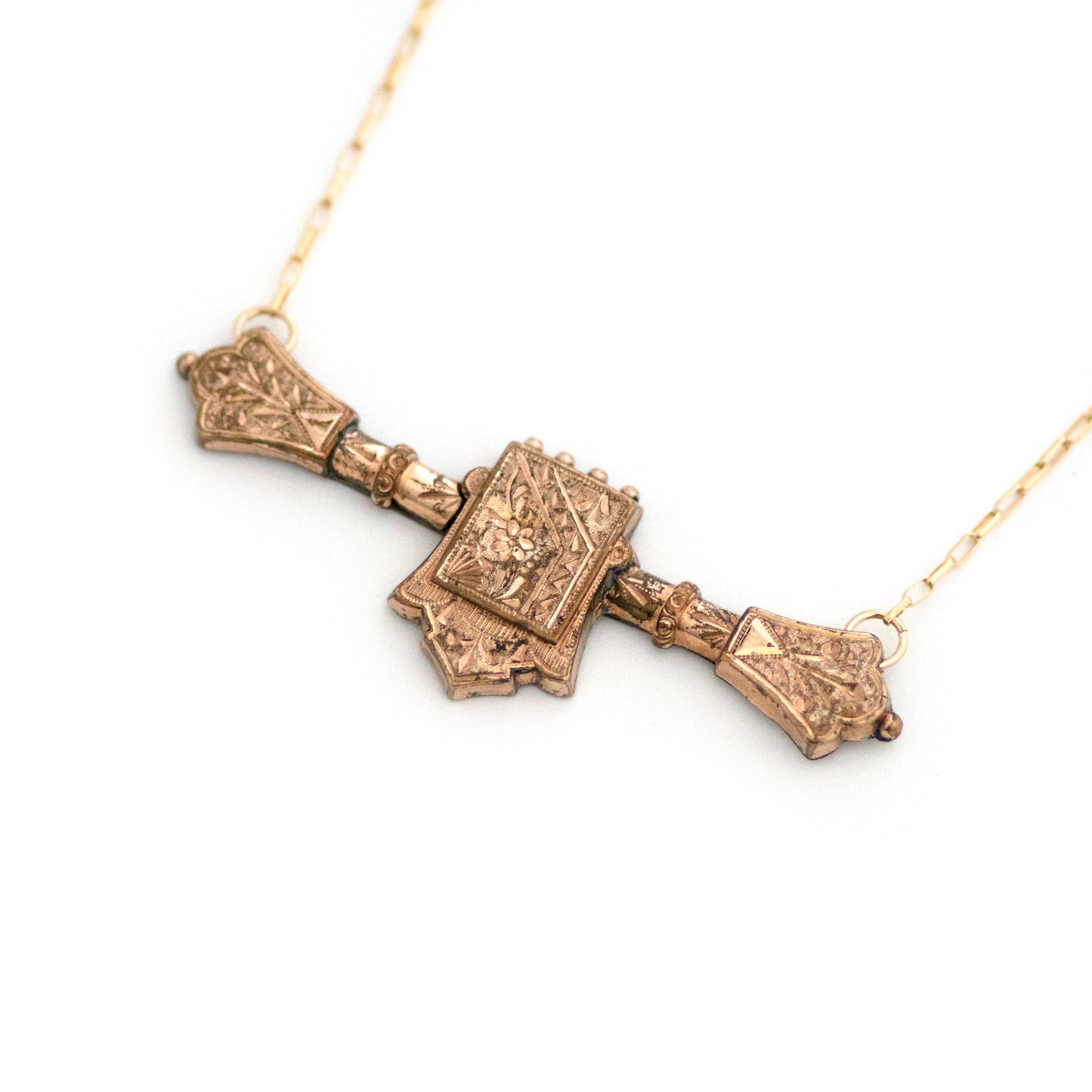 This one-of-a-kind conversion necklace is made up of: Gold filled Victorian bar pin pendant from the late 1800s with hand tooled details including floral accents.