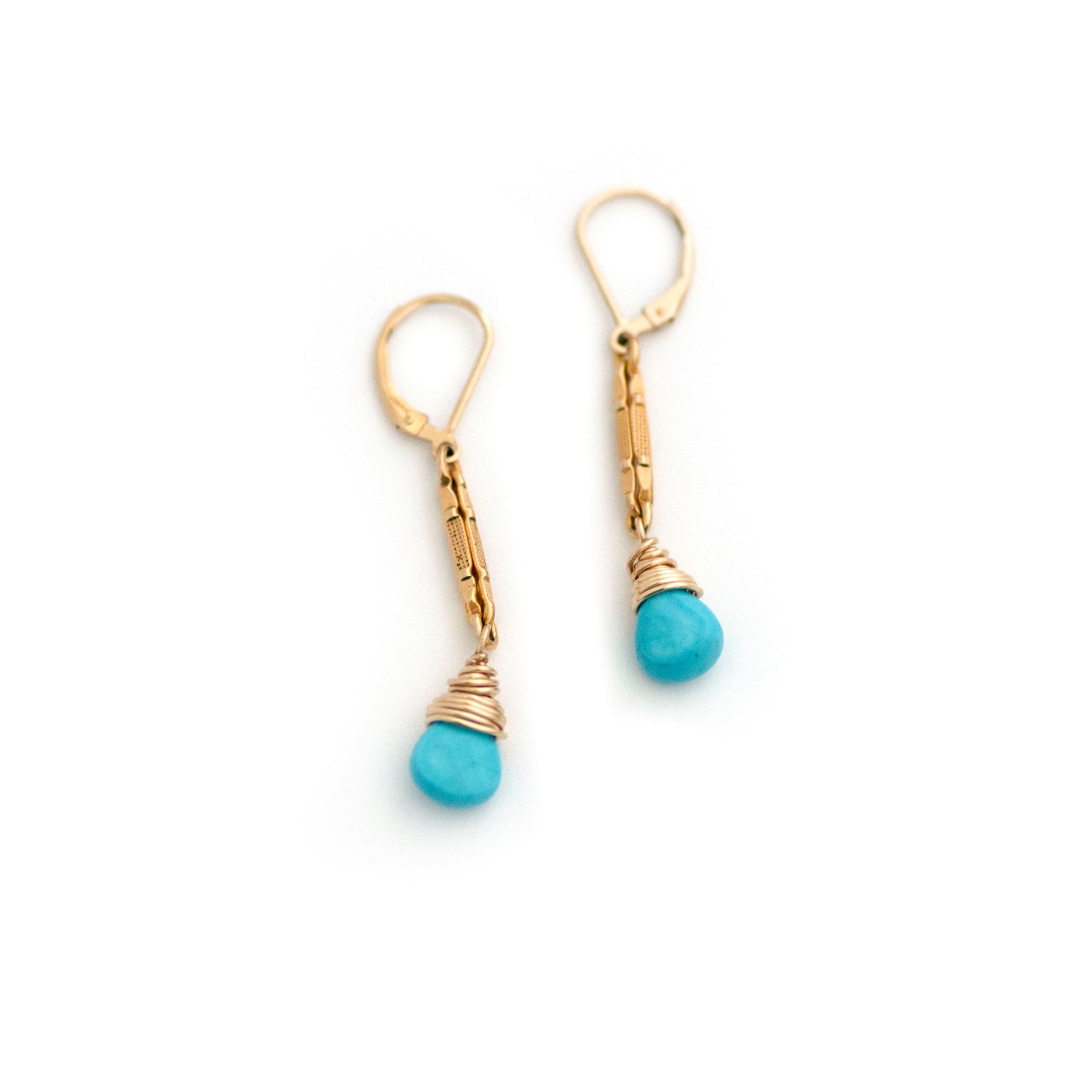 These one-of-a-kind conversion earrings are made up of: Gold filled antique Victorian watch chain links from the late 1800s with hand tooled details. Arizona turquoise.