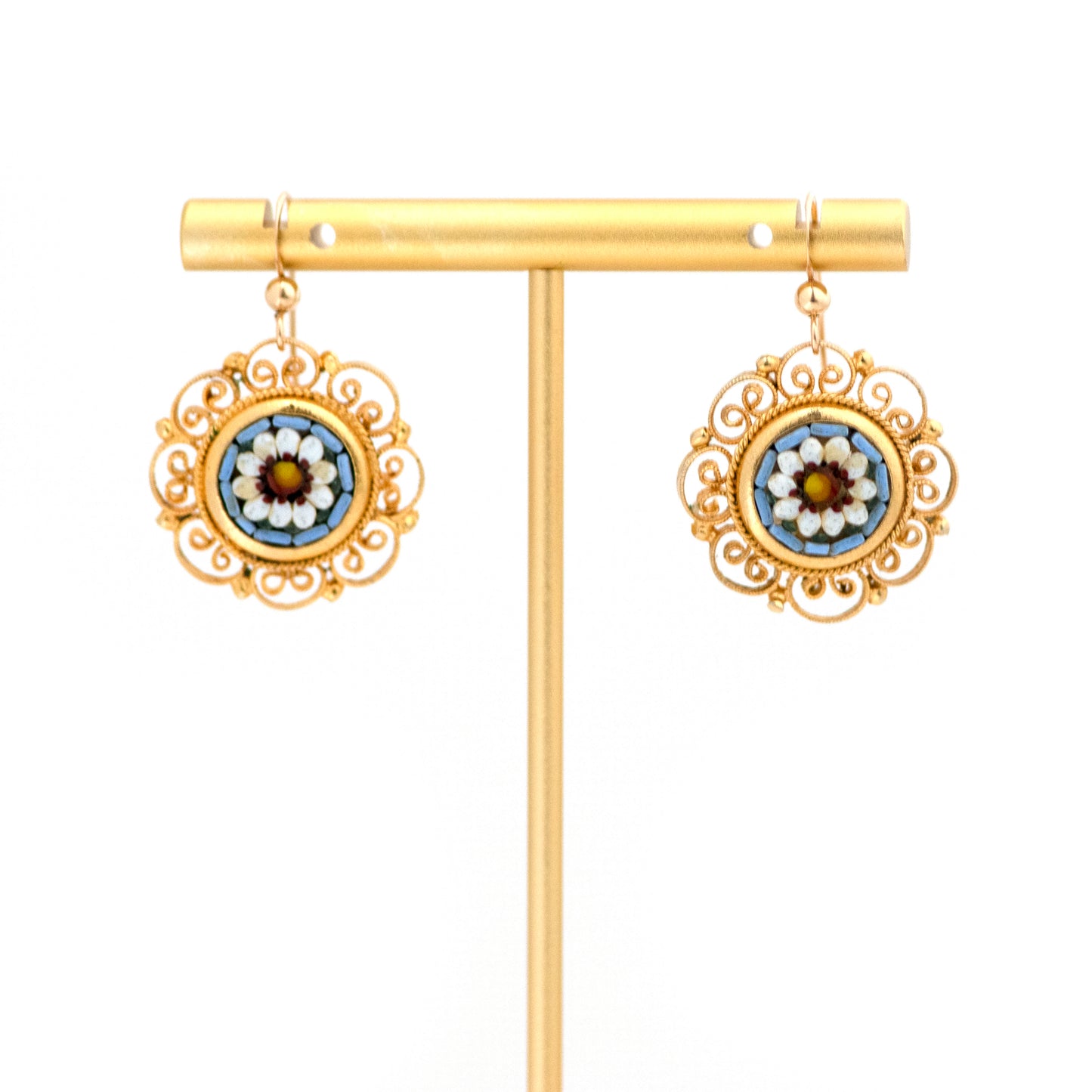 Blue and White Flower Italian Micro Mosaic Earrings hanging on a T-stand earring display.