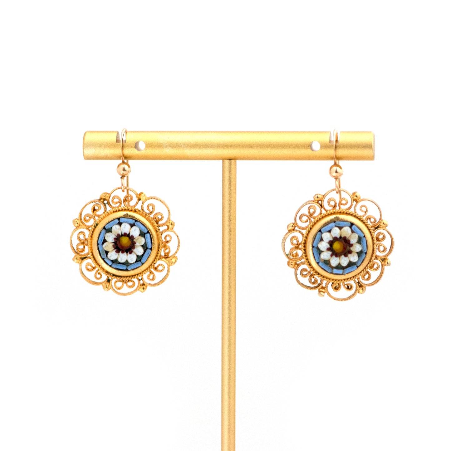 Blue and White Flower Italian Micro Mosaic Earrings hanging on a T-stand earring display.