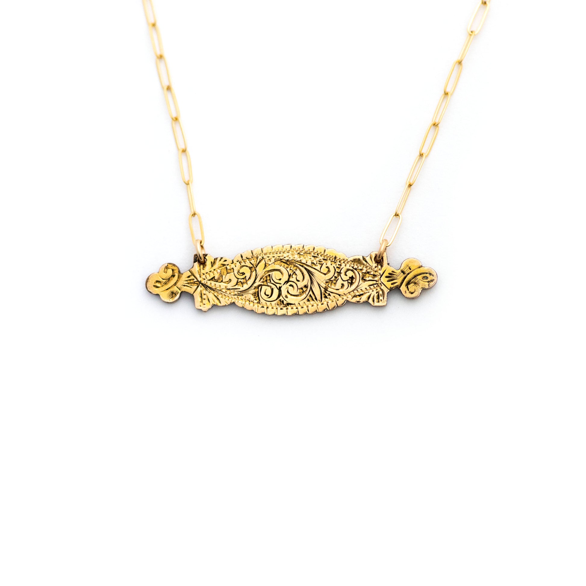 This one-of-a-kind conversion necklace is made up of:  Gold filled Victorian bar pin pendant from the late 1800s with hand engraved scrolling floral details. 