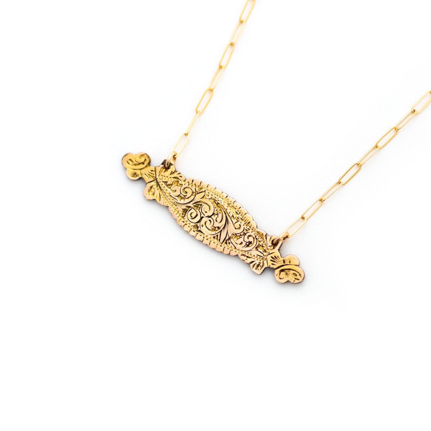 This one-of-a-kind conversion necklace is made up of:  Gold filled Victorian bar pin pendant from the late 1800s with hand engraved scrolling floral details. 