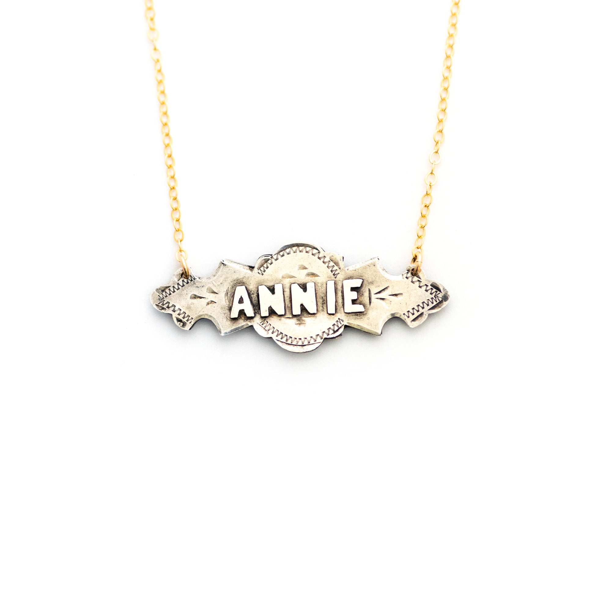 This one-of-a-kind conversion necklace is made up of:  Sterling silver Edwardian bar pin pendant from the early 1900s with hand engraved details and the name "ANNIE". 