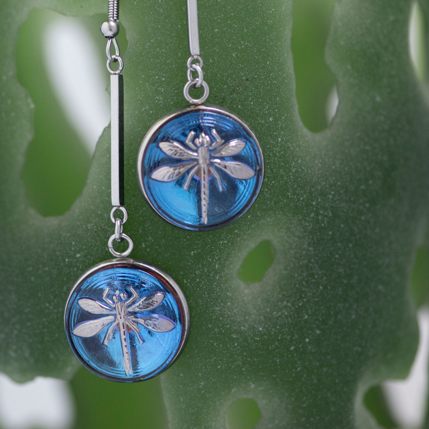 Blue and platinum painted Czech glass button drop dangle earrings.