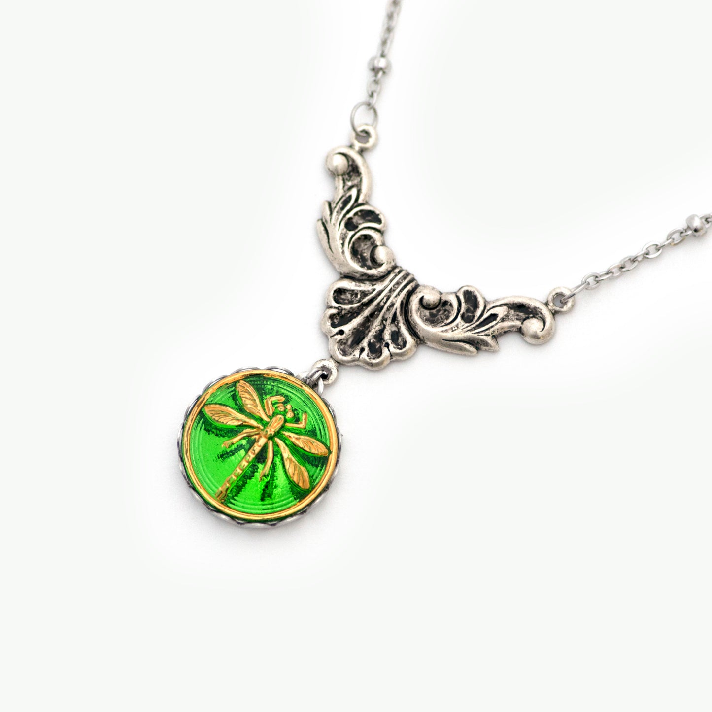 Green and gold painted dragonfly Czech glass button. Button pendant necklace.