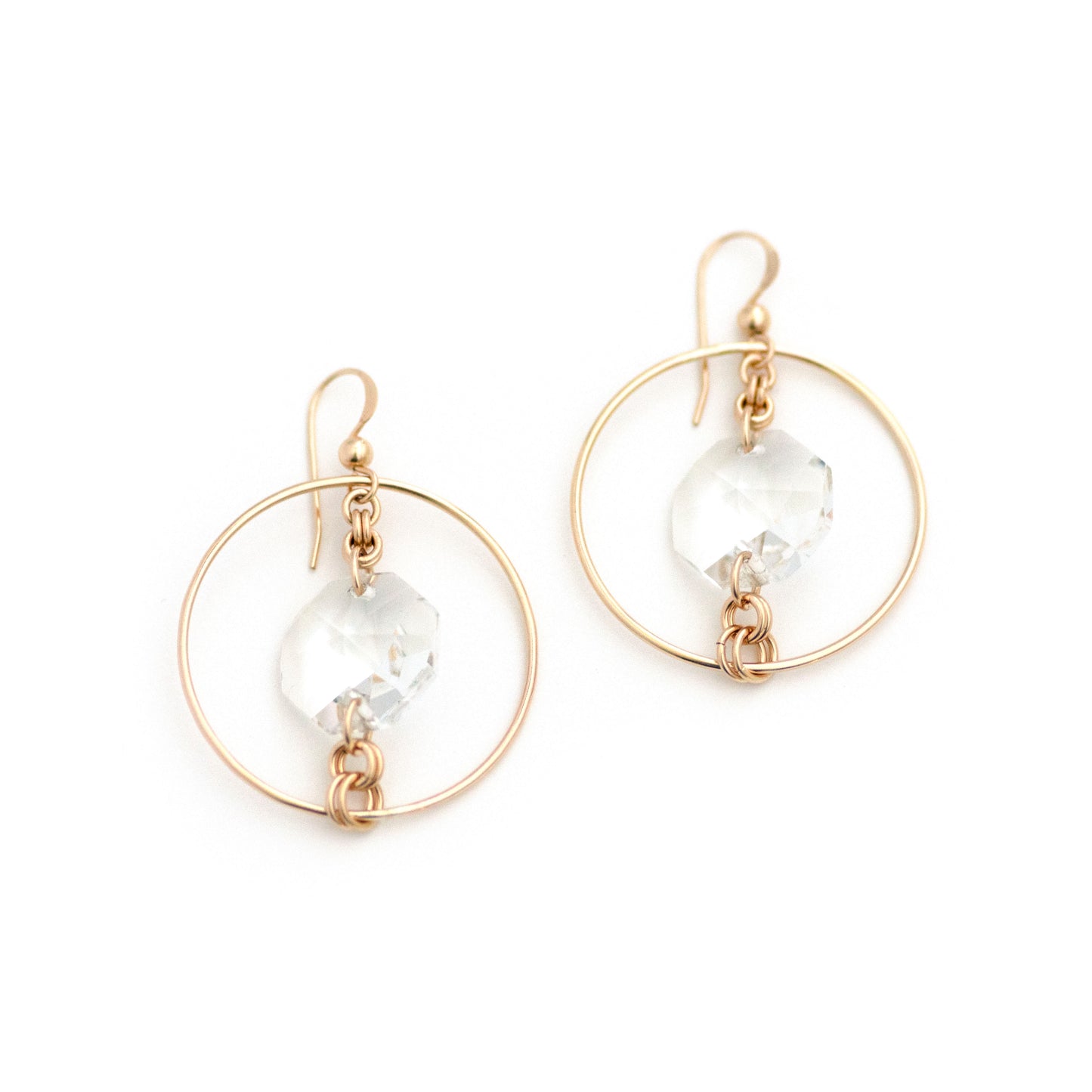 These repurposed vintage earrings are made up of:  Chandelier crystal glass prisms and 14k gold fill.