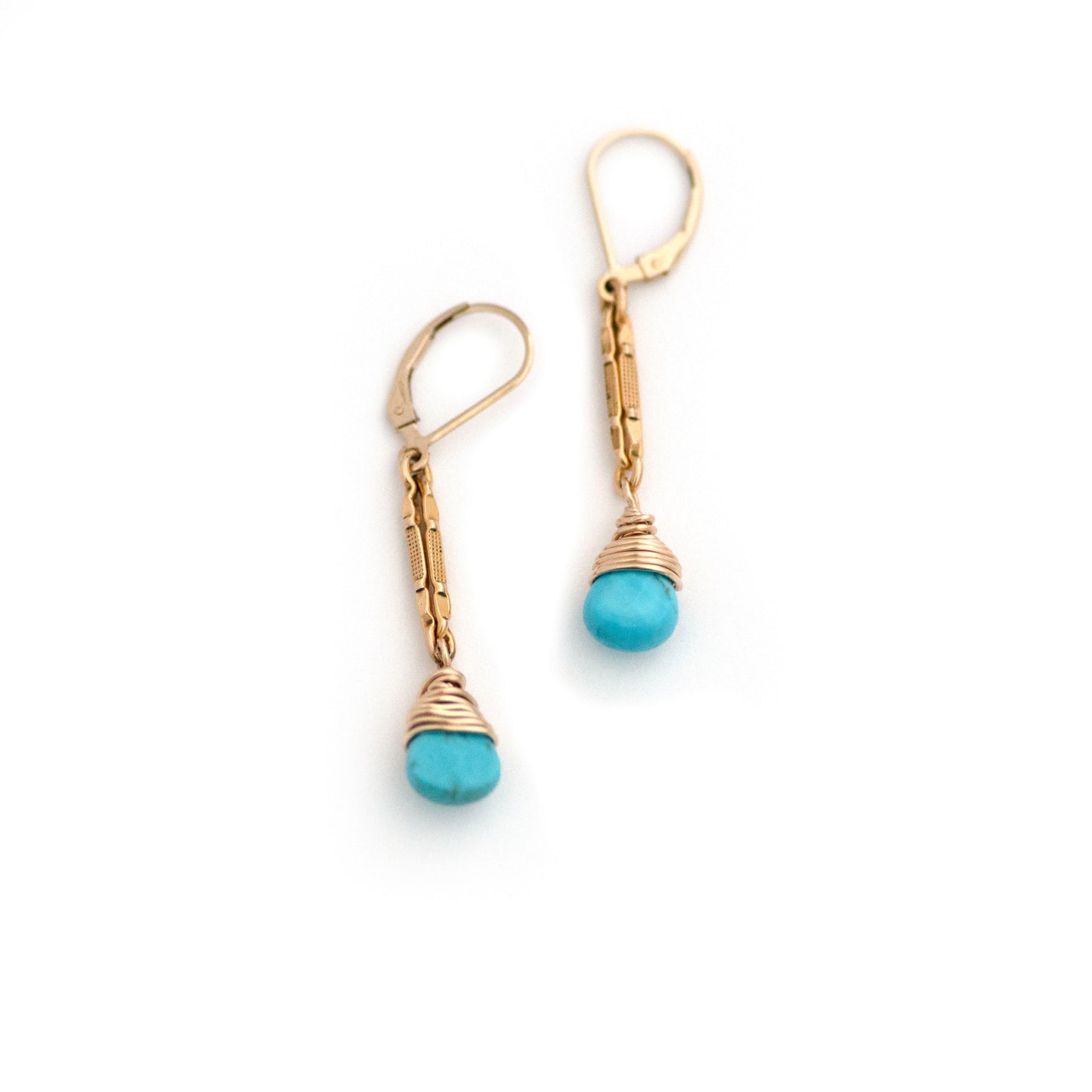 These one-of-a-kind conversion earrings are made up of:  Gold filled antique Victorian watch chain links from the late 1800s with hand tooled details. Arizona turquoise.