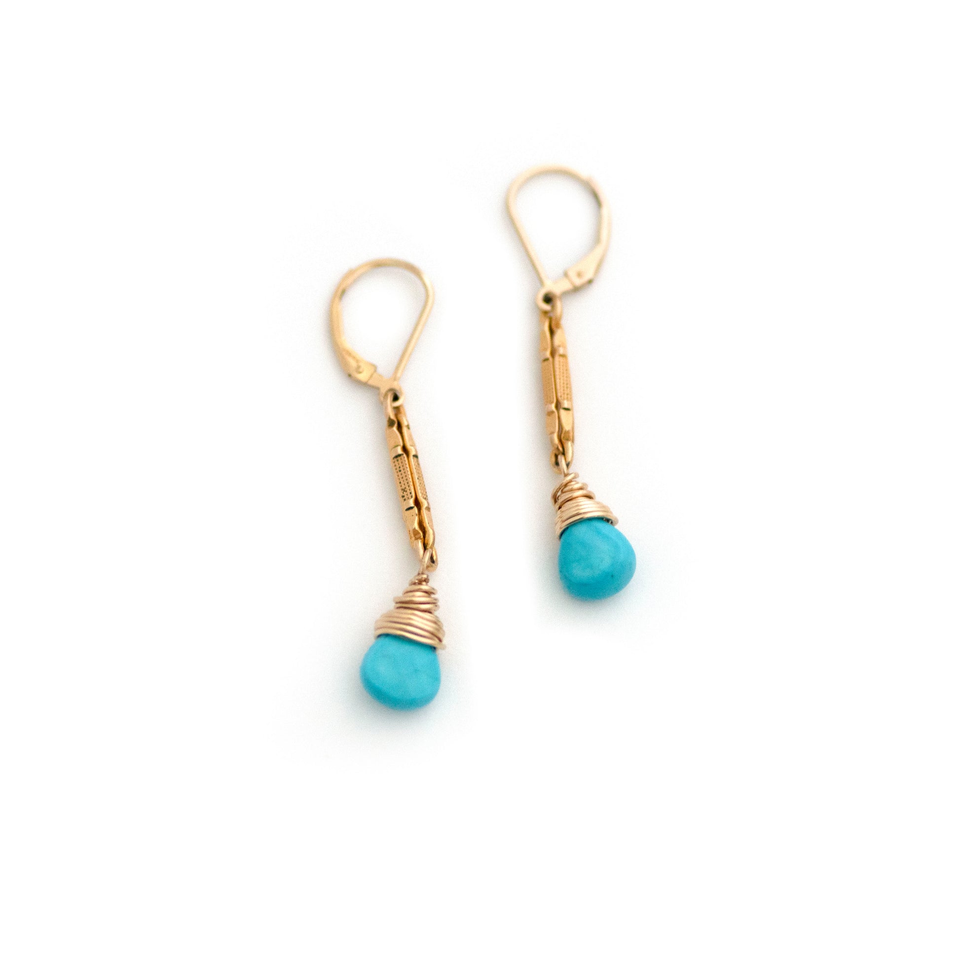 These one-of-a-kind conversion earrings are made up of:  Gold filled antique Victorian watch chain links from the late 1800s with hand tooled details. Arizona turquoise.