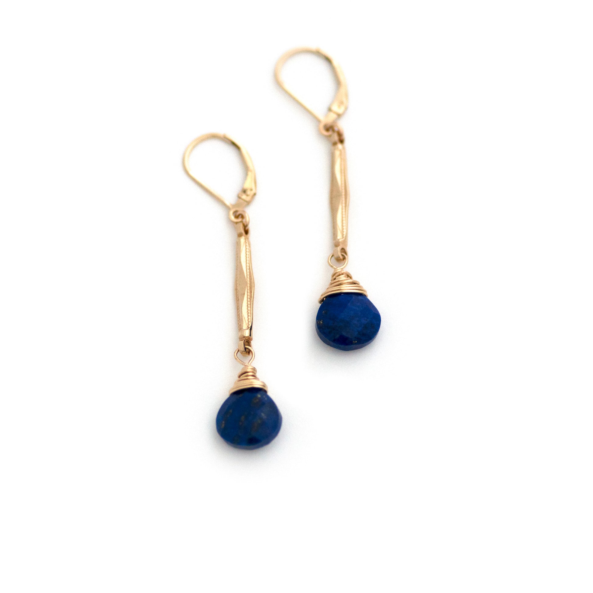 These one-of-a-kind conversion earrings are made up of:  Gold filled antique Edwardian watch chain links from the early 1900s with hand tooled details. Lapis lazuli.