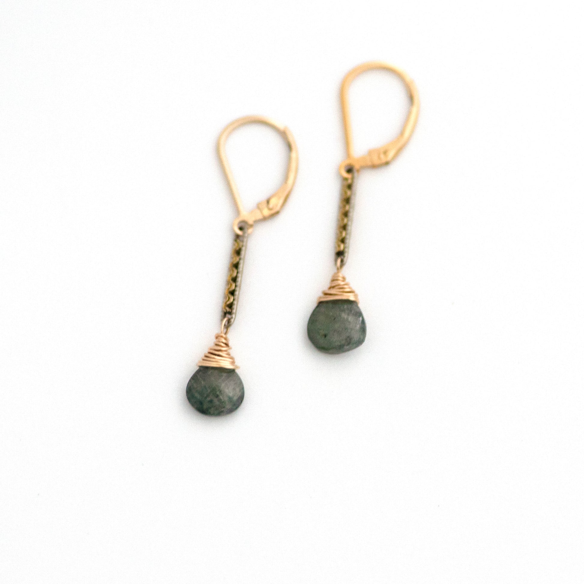 These one-of-a-kind conversion earrings are made up of:  Gold filled and silver tone Edwardian watch chain links from the early 1900s with hand tooled details. Moss aquamarine.