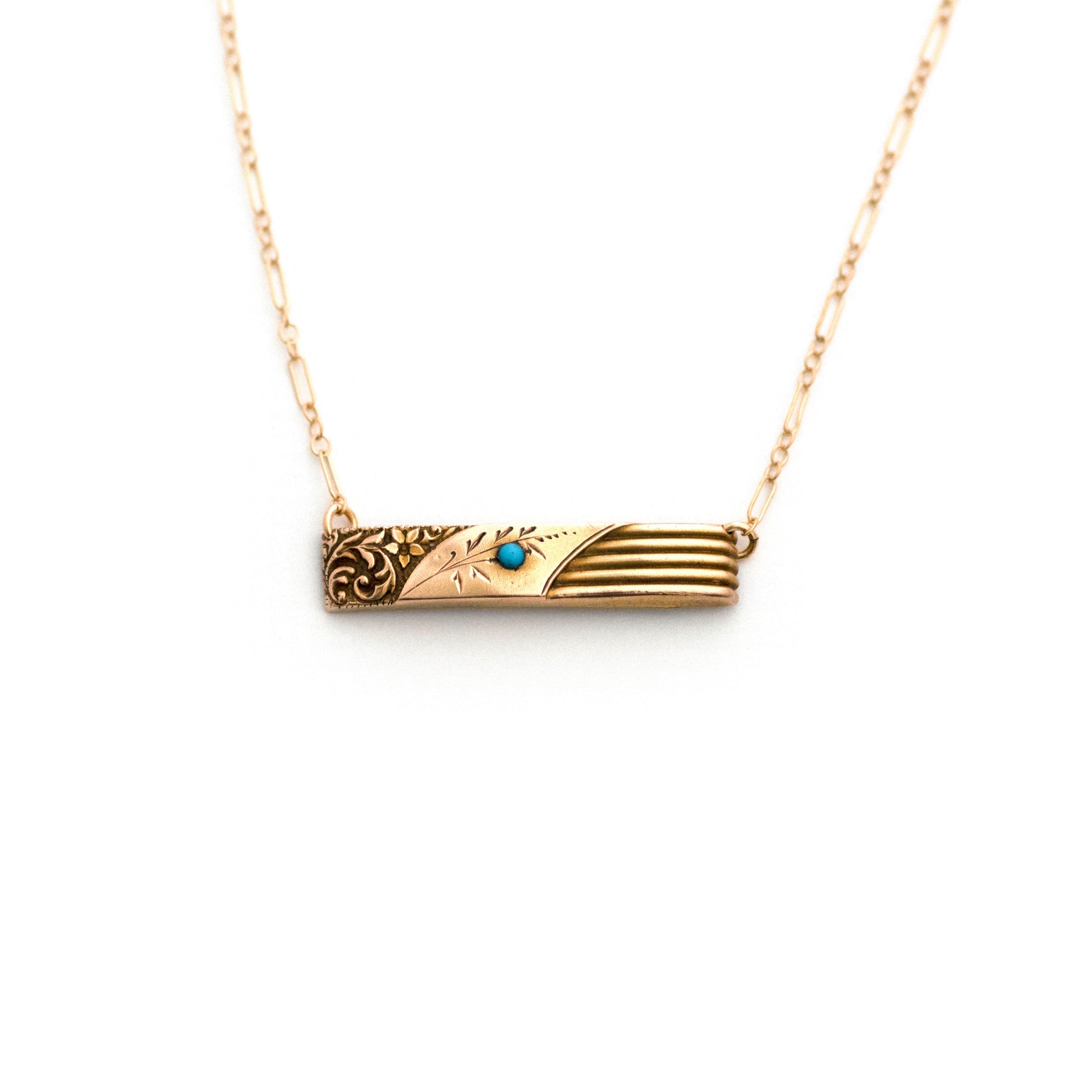 This one-of-a-kind conversion necklace is made up of:  Solid 10k gold Victorian bar pin pendant from the late 1800s with hand tooled details and a turquoise stone accent.