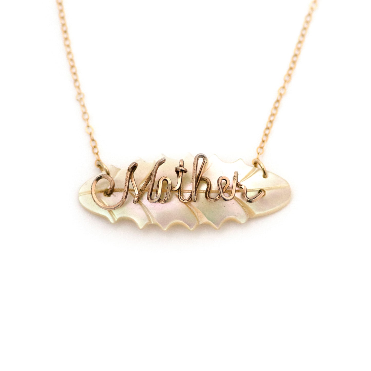 "Mother" gold filled and mother of pearl leaf pendant necklace. Pendant is converted from a mid century brooch.