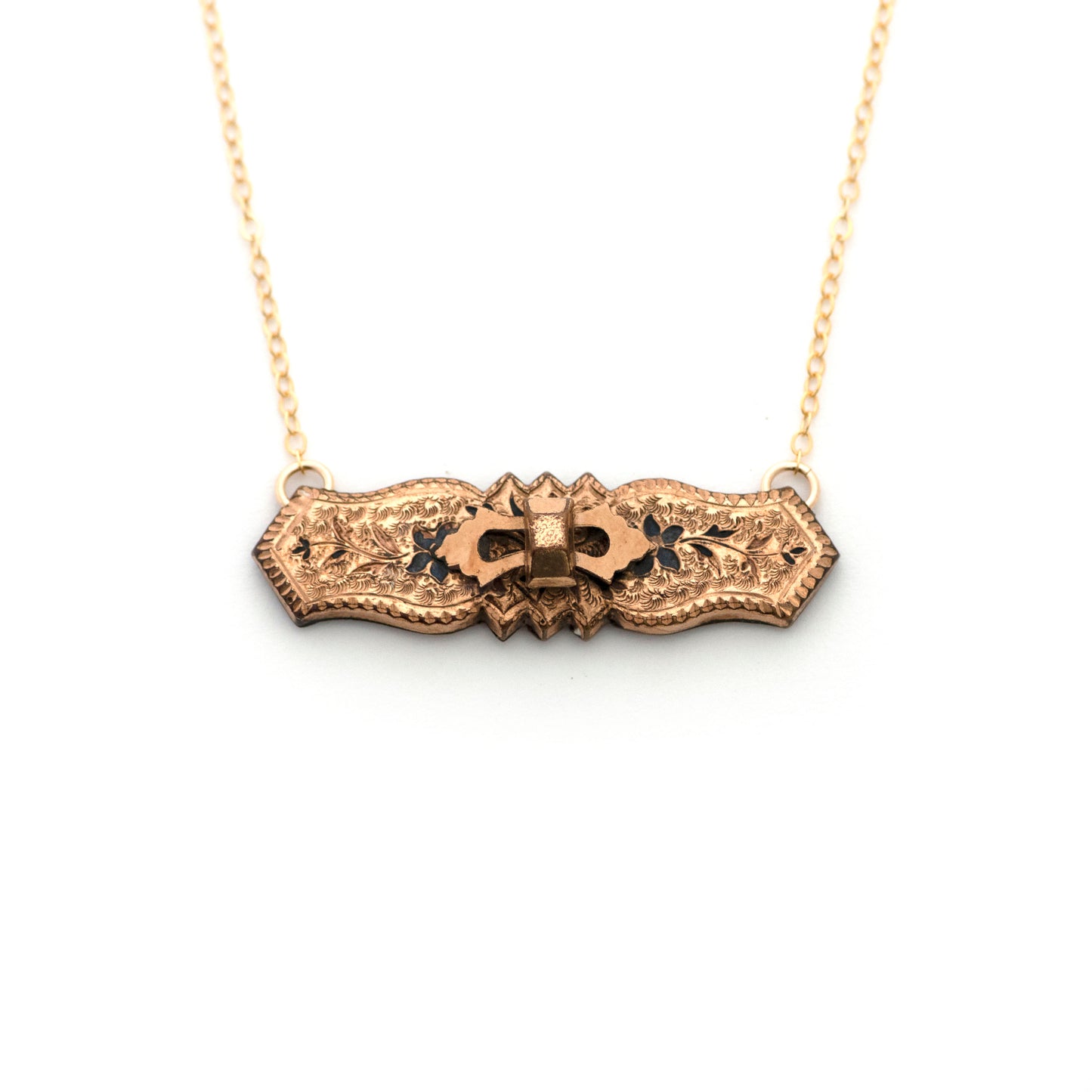 An antique necklace made from converting a Victorian bar pin into a pendant and attaching a new 14k gold filled chain.