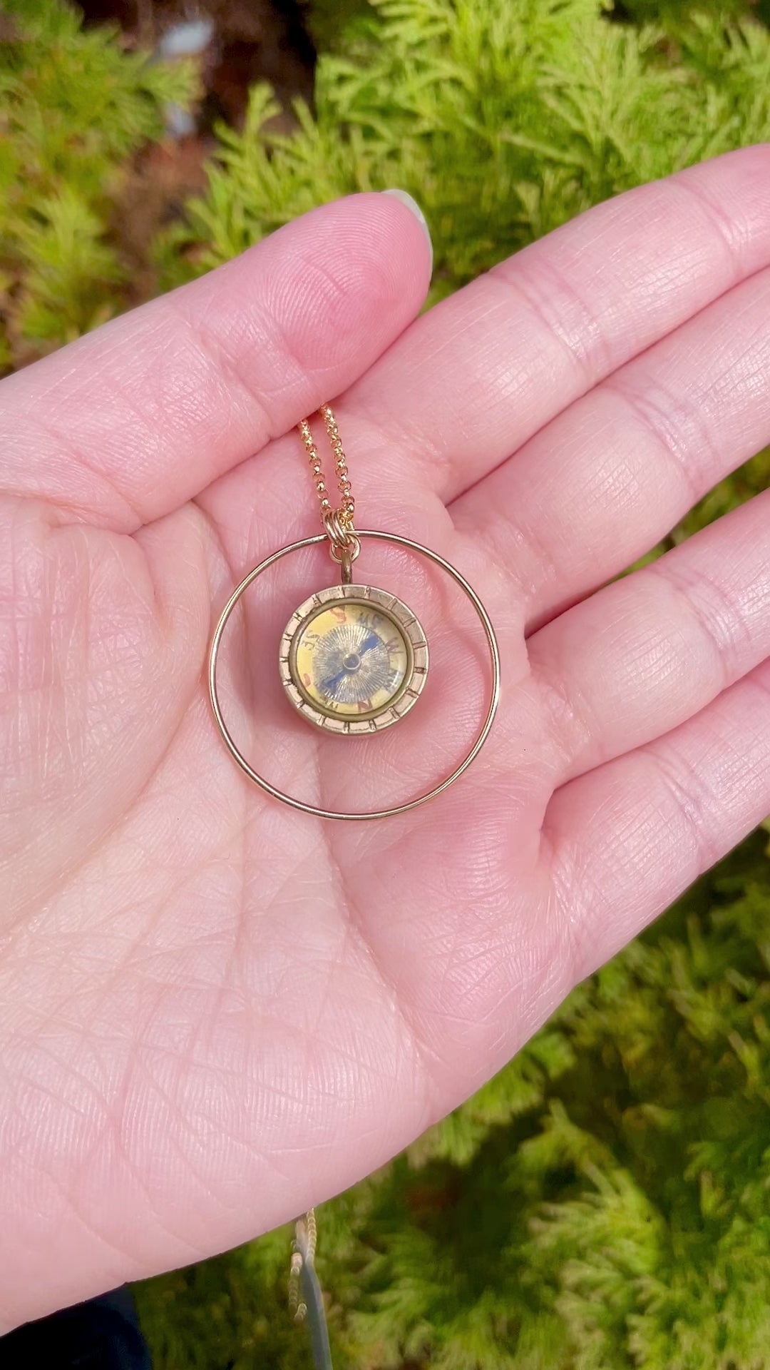video of circle compass watch fob necklace