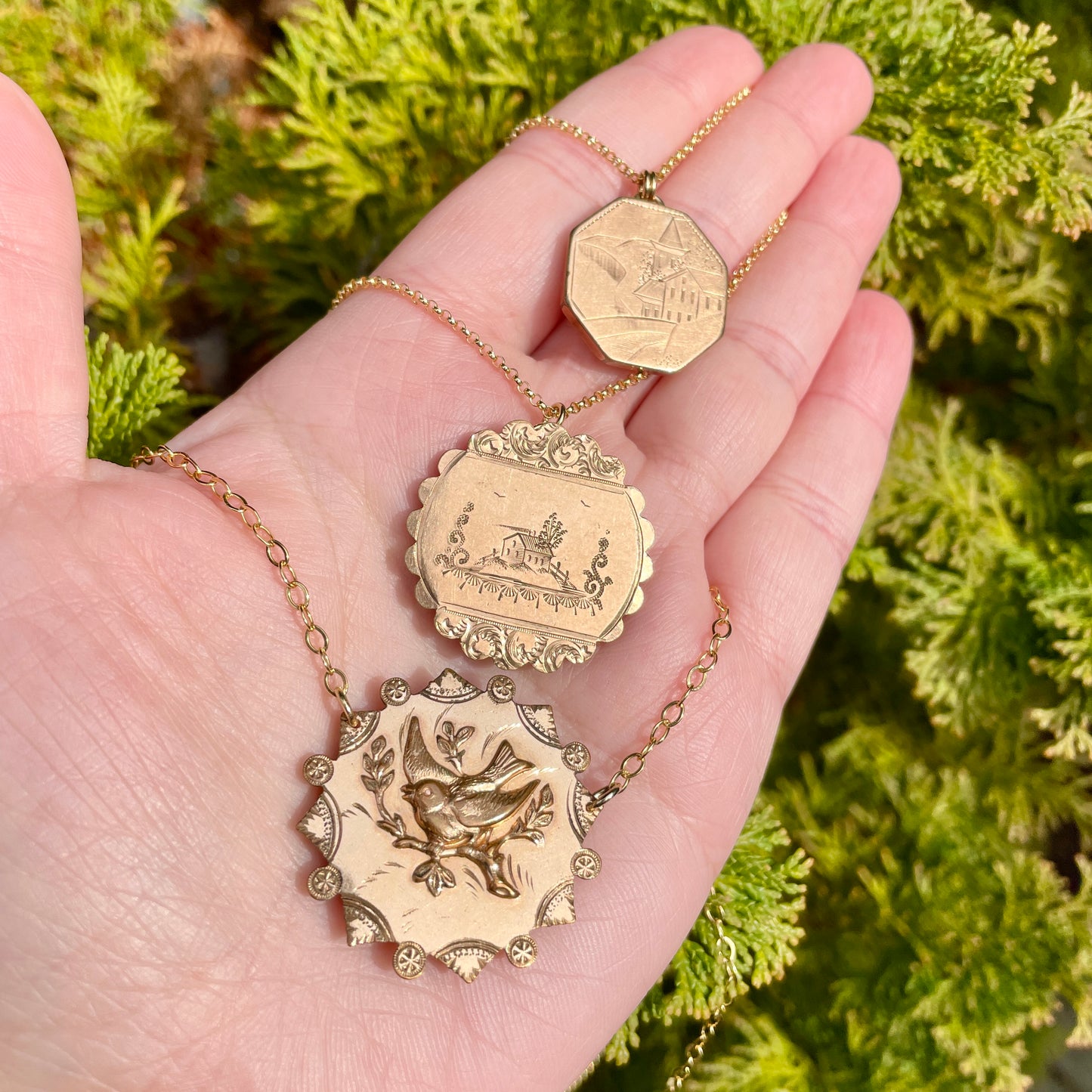 one cufflink and two brooch conversion necklaces